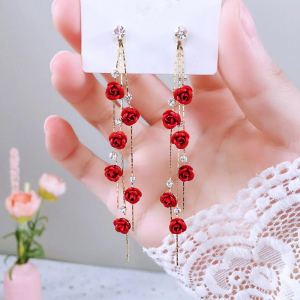 Boucles d'oreilles longues fleur rose strass rouge