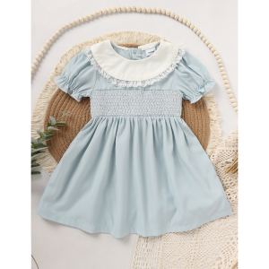 Robe smockée manches bouffantes dentelle fillette