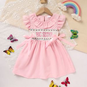 Robe fillette rose à manches volantées broderie lettres nœud