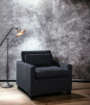 Chaise pivotante Naveen gris tissu avec coussin