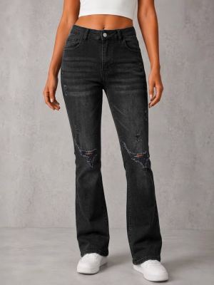 Jean femme taille haute évasé déchiré noir délavé stretch