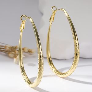 Boucles d'oreilles œuf dorées brillantes ressort printemps cuivre
