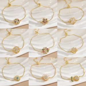 Bracelet fleur cuivre doré rotatif préservant